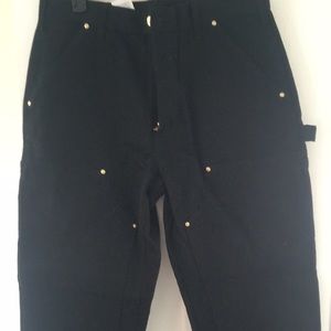 Double front, firm duck, black Carhartt pants.